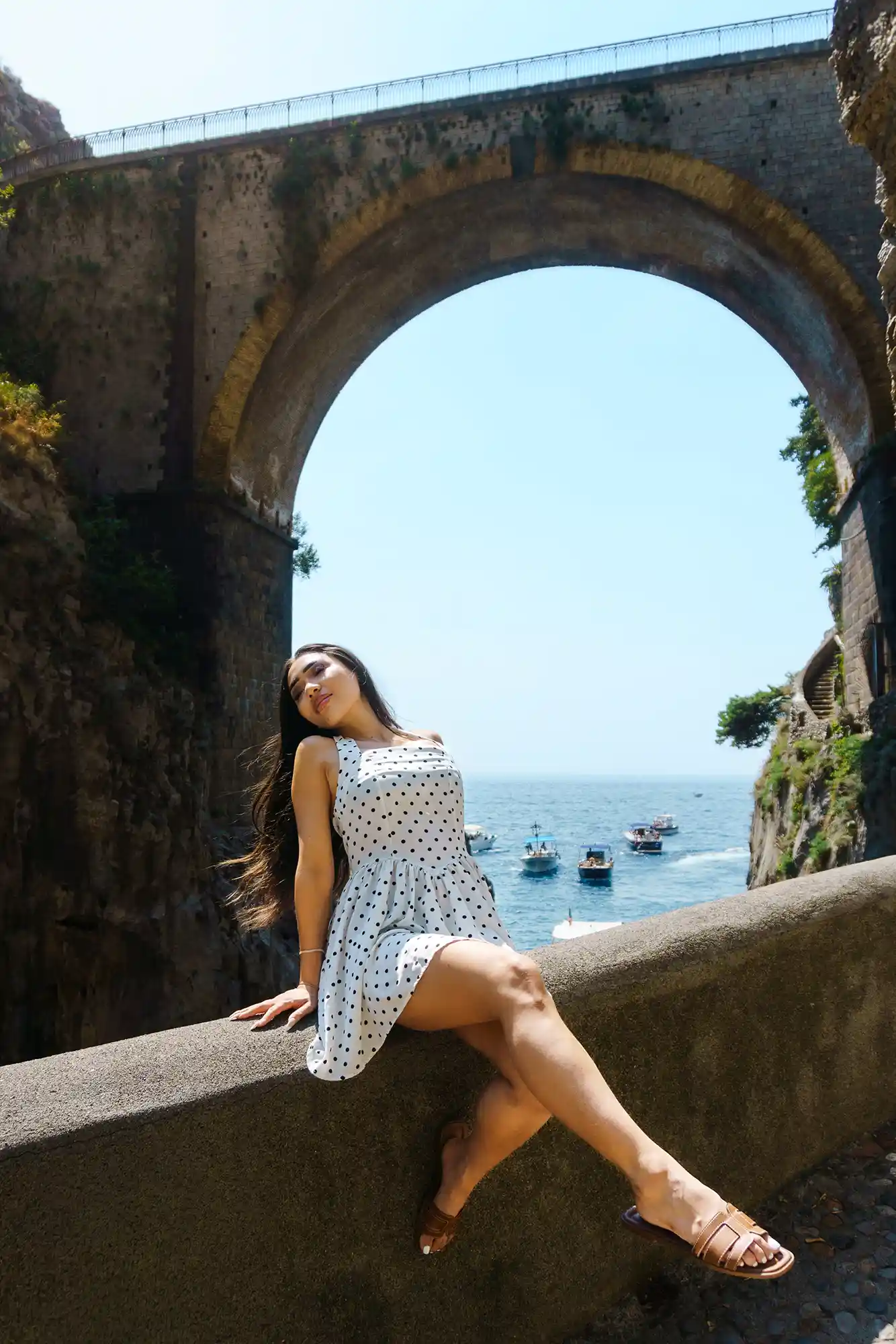 dramatic yong lady photo in the red rosebush